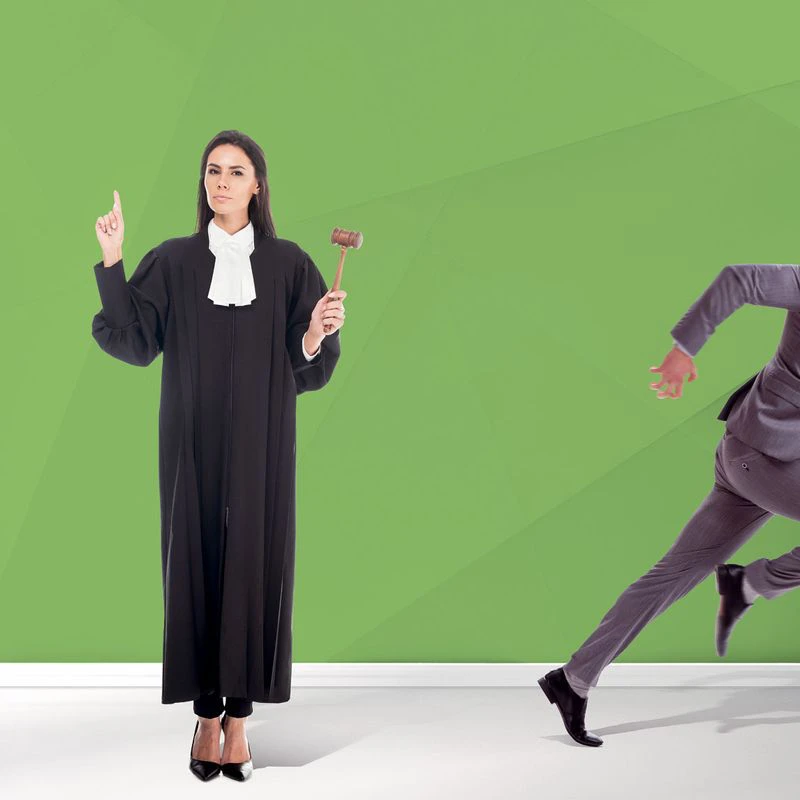 A female judge in traditional judicial robes holds a gavel and raises one finger, standing confidently against a green geometric background. To her right, a man in a suit is seen running away at full speed. Text on the left reads ‘Expert Assist’ followed by ‘Legally binding solutions, but with a lot more pace.’