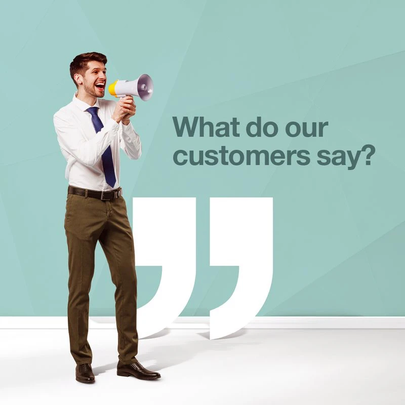 A professional man in business attire speaking into a megaphone, symbolising communication and testimonials, with text reading ‘What do our customers say?’ and large quotation marks on a teal background.